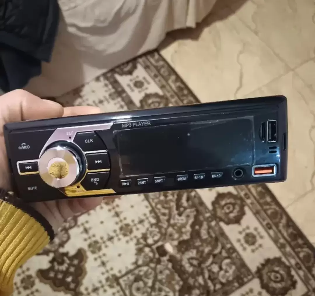 Kasetofon universal per makine